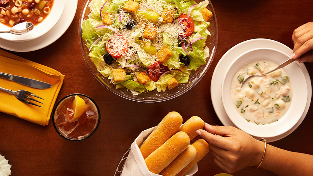 Olive Garden meal with salad and breadsticks