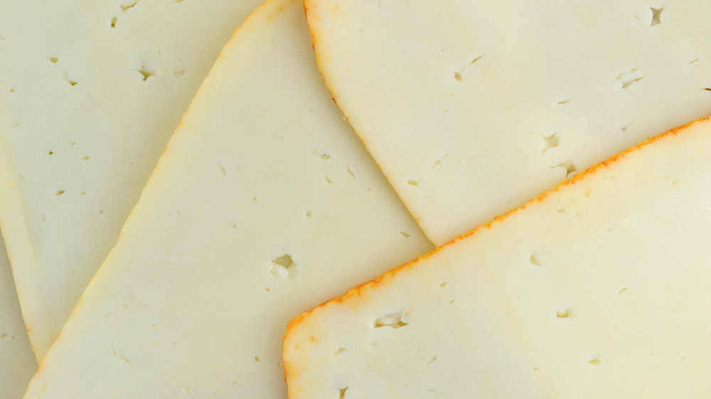 Slices of muenster cheese