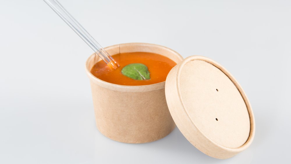 Soup in a cardboard takeout container