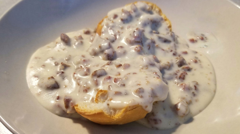 Biscuits and gravy on plate