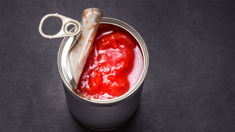 An opened can of tomatoes 