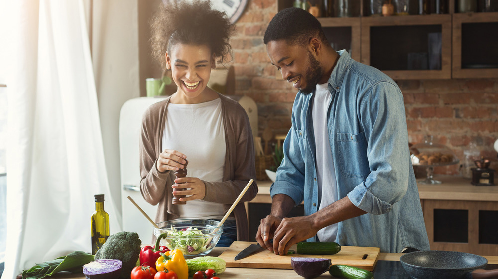 Couple cooking together