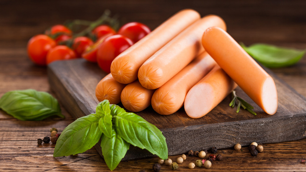 Hot dogs on a black platter