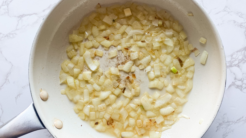 onions and garlic in pan