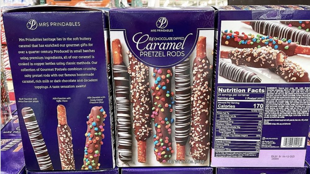 A box of Mrs. Prindables Chocolate Dipped Caramel Pretzel Rods