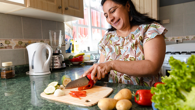 cutting raw cucumber