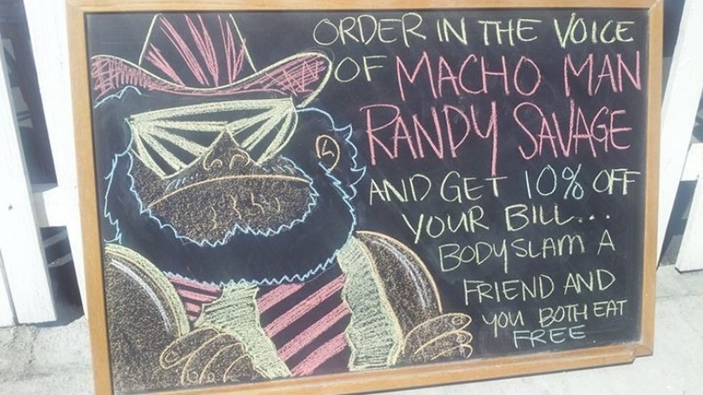 Chalkboard advertising Randy Savage restaurant promo