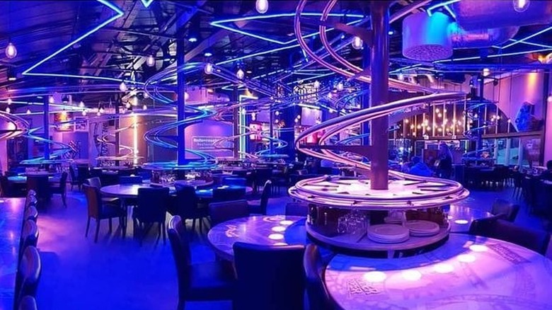 Purple lighting in the interior of the Rollercoaster Restaurant