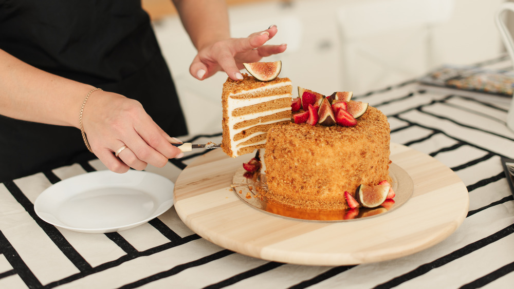 Cutting into cake