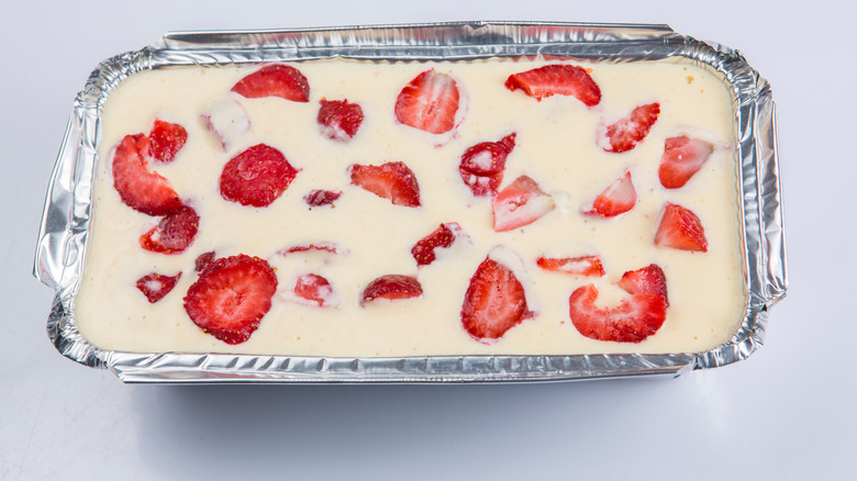 Strawberries and cream in aluminum pan