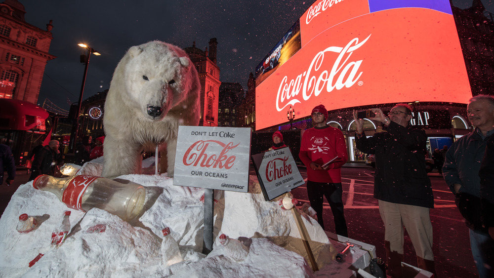 Greenpeace activists in London demonstrate with a constructed scene in which a polar bear existentially considers how wonderful it is that it's life has been surrendered to the progress of Coca-Cola. "To choke or not to Coke, that is the question."