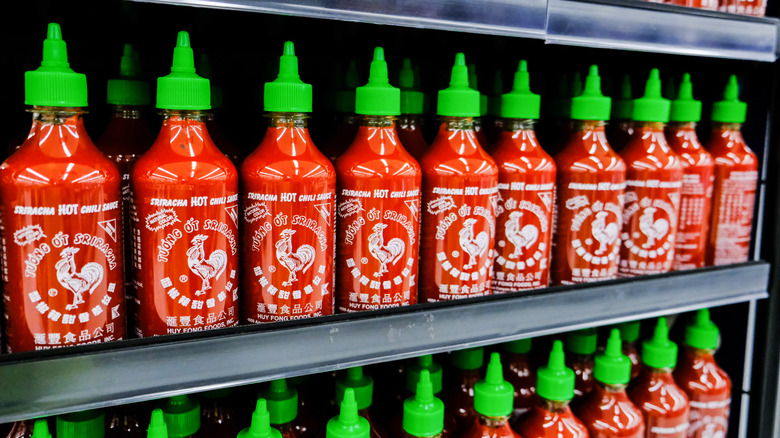 Red Sriracha on a shelf