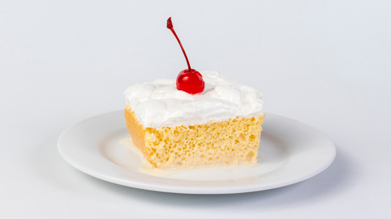 Tres Leches cake with cherry