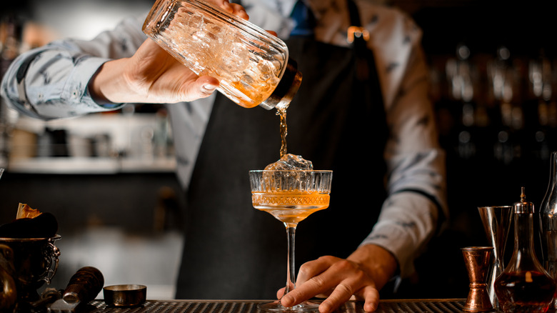 Bartender pouring drink