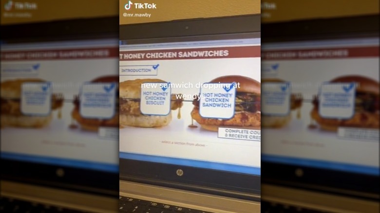 Instructional video for Wendy's Hot Honey Chicken Sandwiches on a computer screen