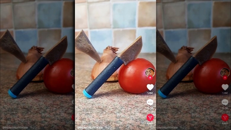 Tofu knife stuck in a tomato