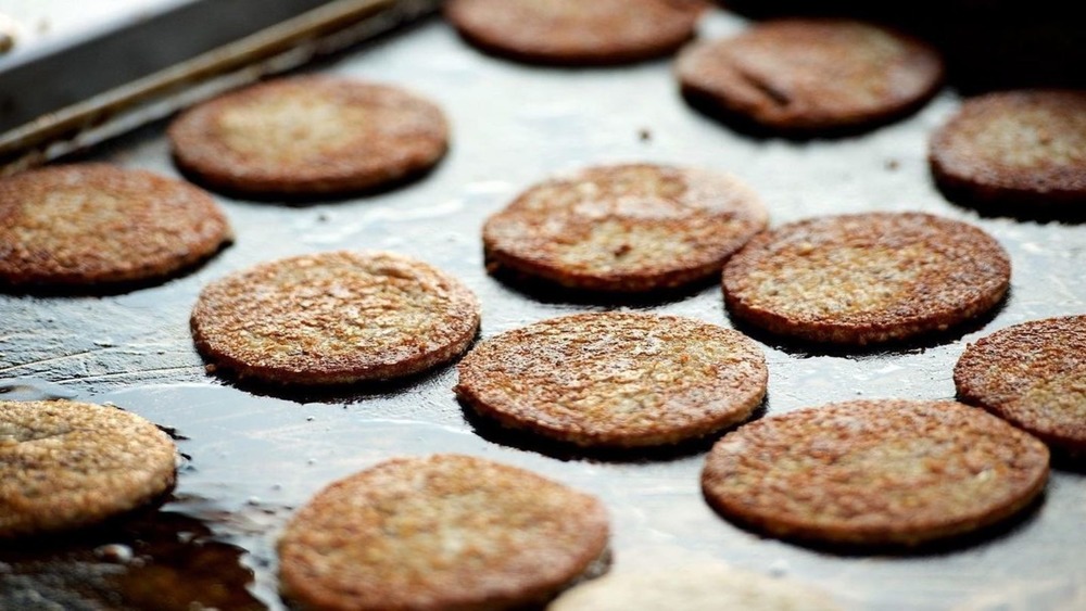 Goetta slices on griddle