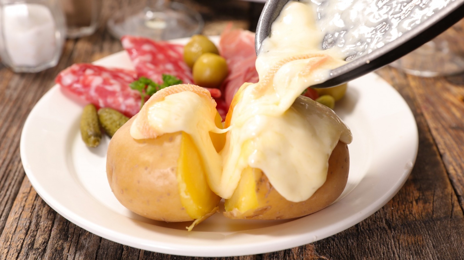 This Traditional Swiss Christmas Eve Meal Is Filled With Cheesy Goodness