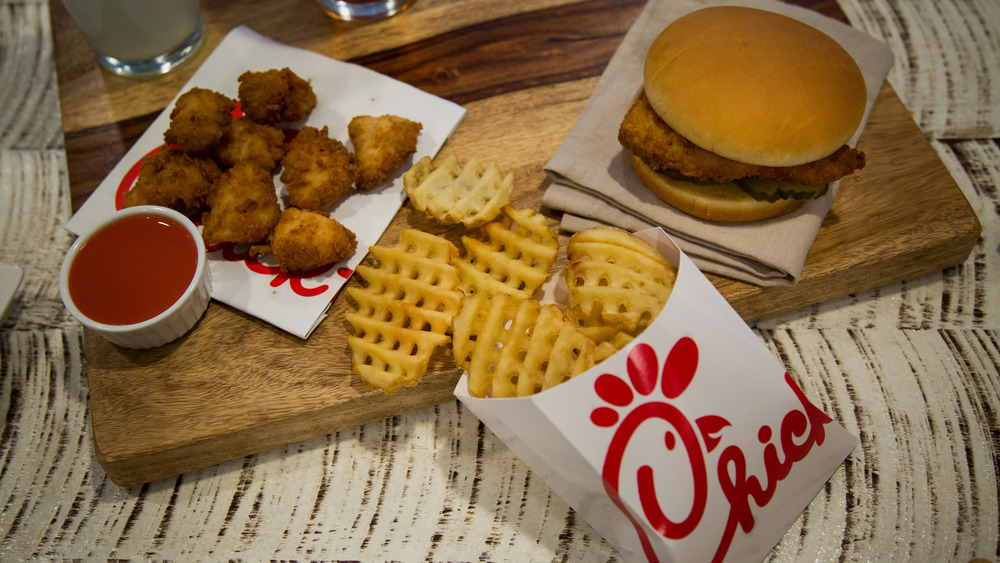 Chick-fil-A chicken sandwich with fries and nuggets