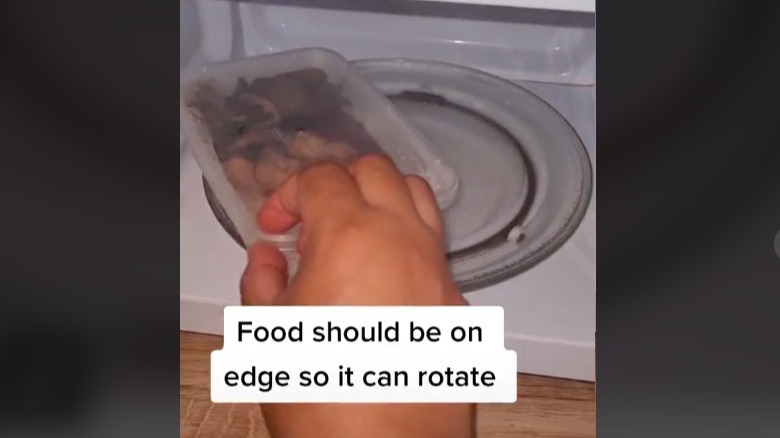 Food on edge of microwave plate