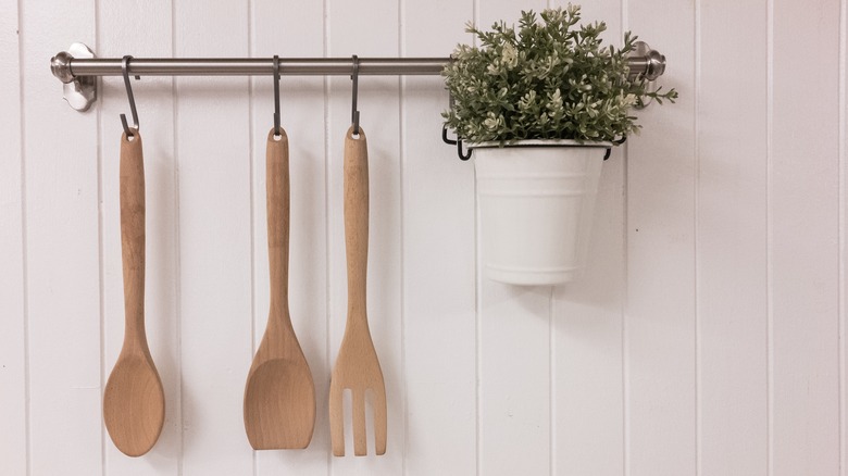 hanging wooden spoons to dry