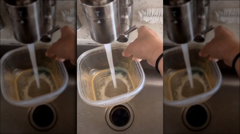 cleaning a stained food storage container