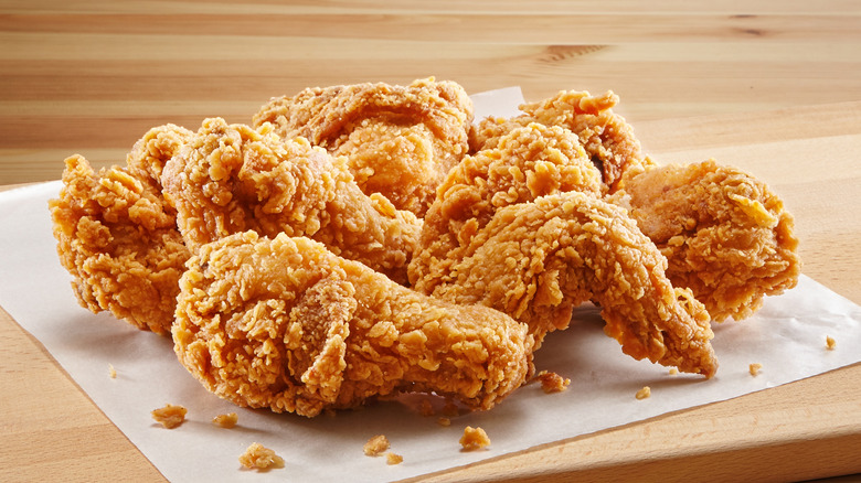 Fried chicken on a wood board