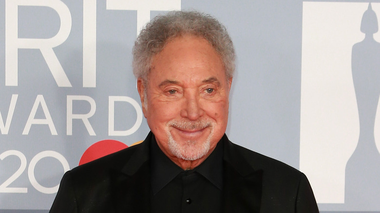 Tom Jones wearing black suit