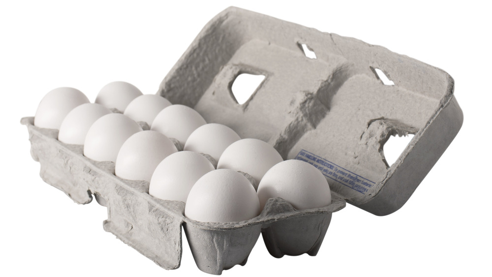 A carton of eggs open