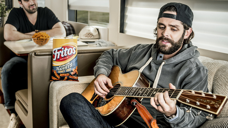 Thomas Rhett with bag of Fritos