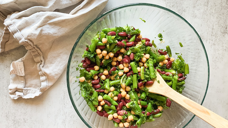 Three bean salad in a mixing bowl