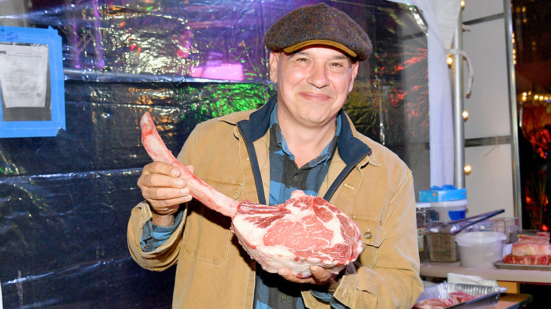 Michael Symon with meat