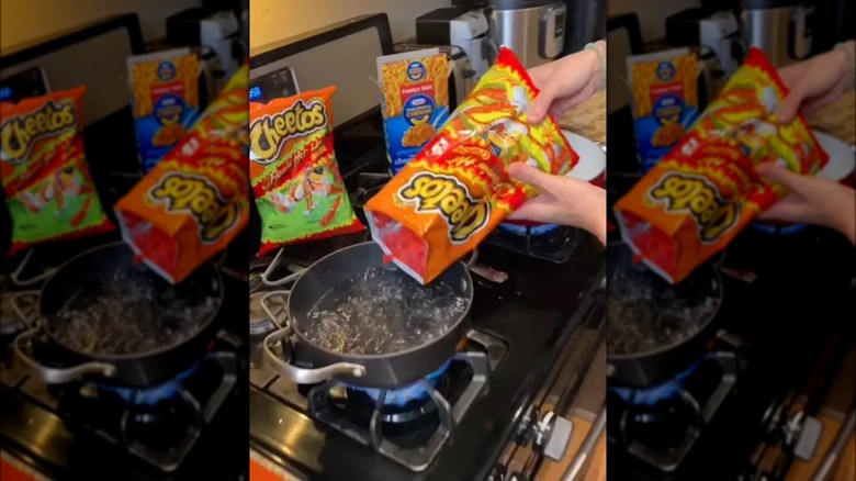 Pouring cheetos into boiling water