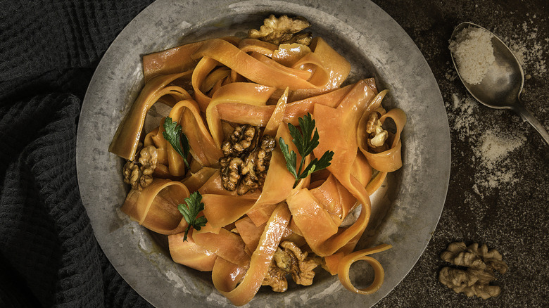 A shredded carrot salad in a bowl