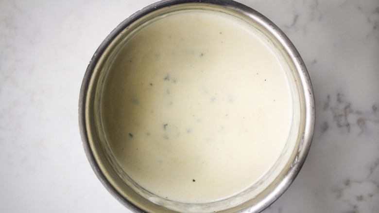 creamy alfredo sauce in pot