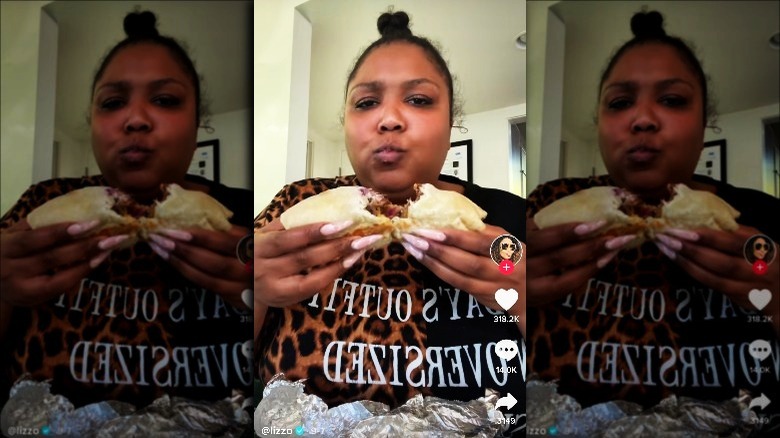 Lizzo eating a burrito