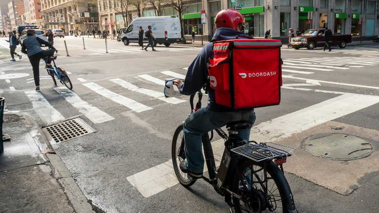 DoorDash delivery person on bike