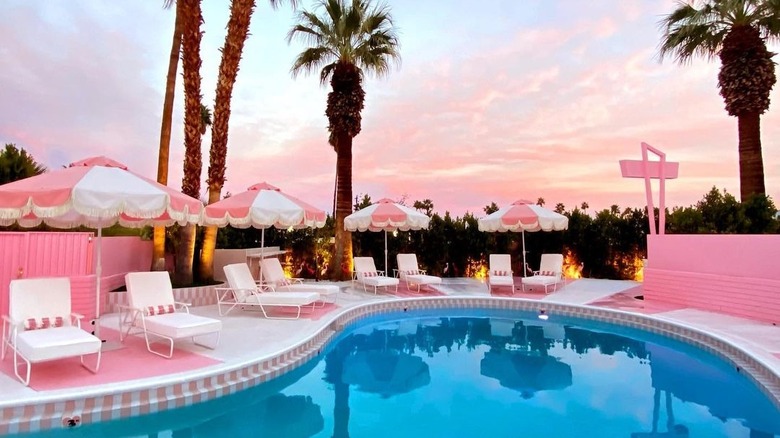 The pink and white pool area at Palm Springs's Trixie Motel