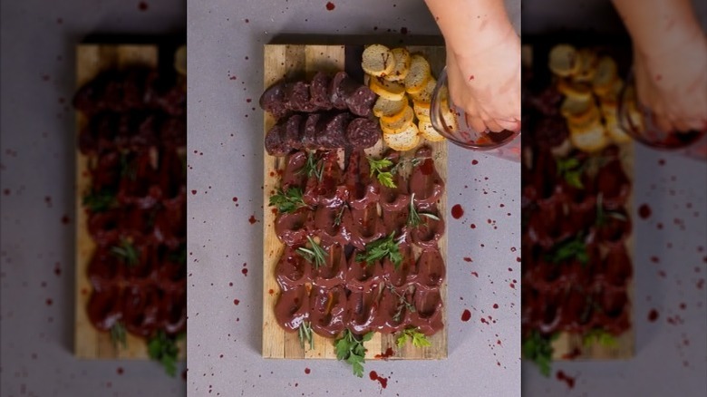 Blood board with animal blood, sundae, and crostini