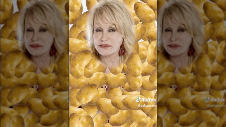 Dolly Parton surrounded by potatoes