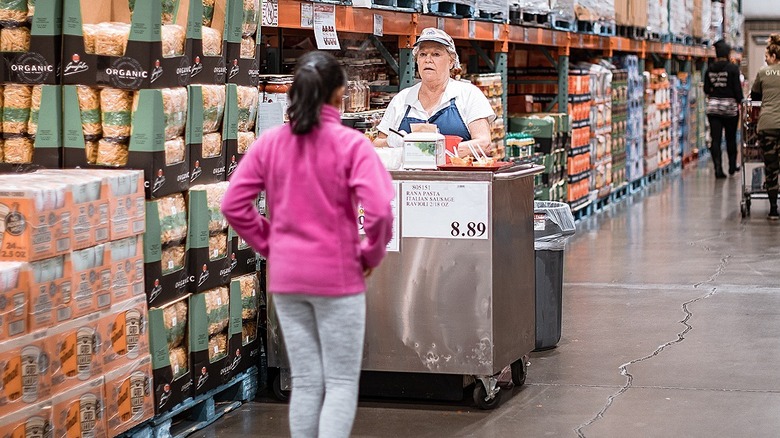 Woman at Costco sample counter