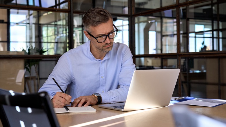 Employee watches training video