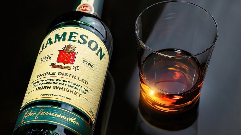 Bottle of Jameson with a glass