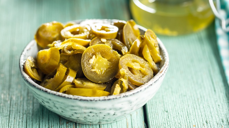 sliced jalapenos in bowl