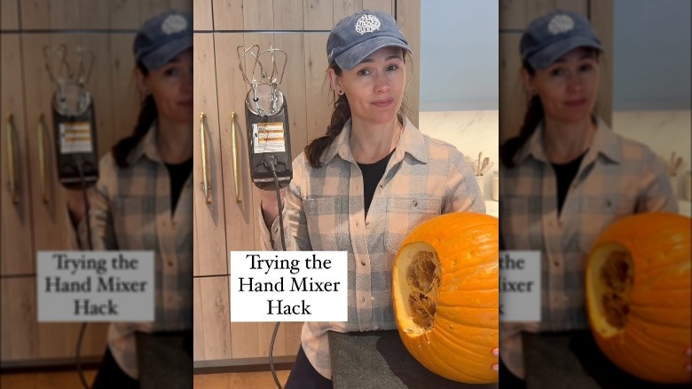 Jennifer Garner cleans a pumpkin with hand mixers