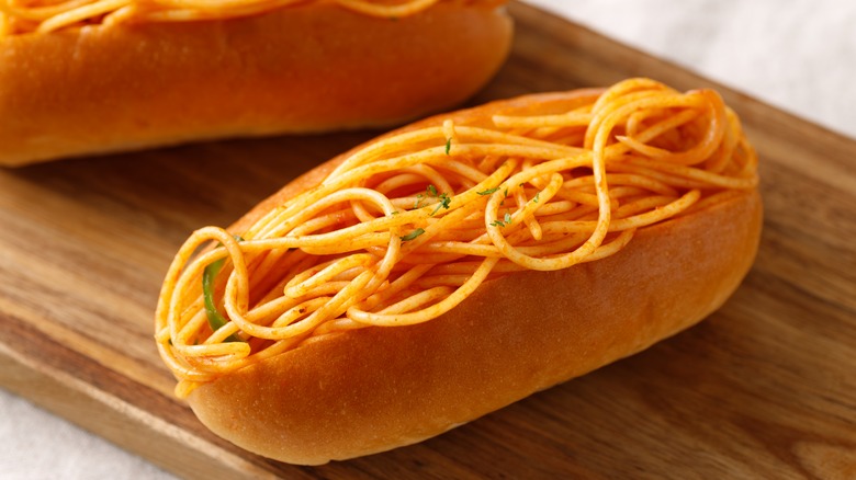 Spaghetti in hot dog bun