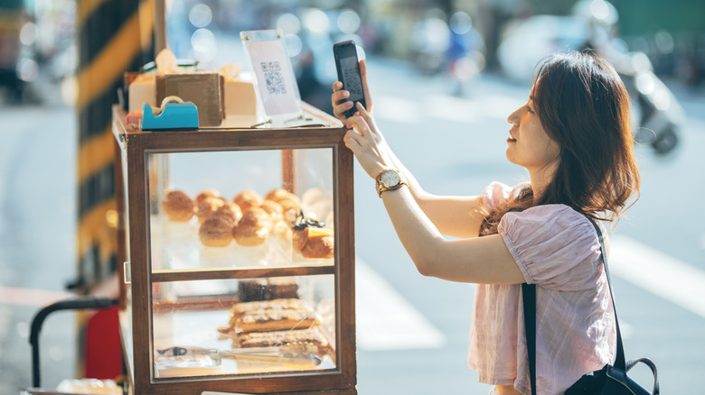 buying food from street vendor