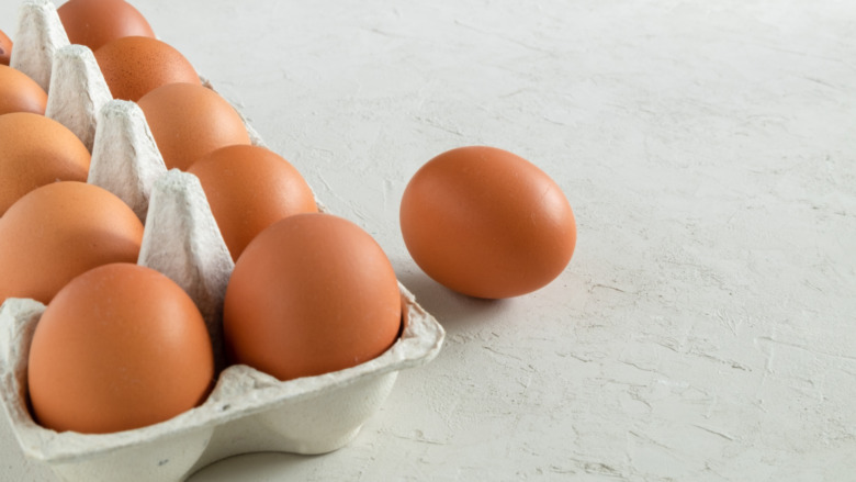 carton of brown eggs