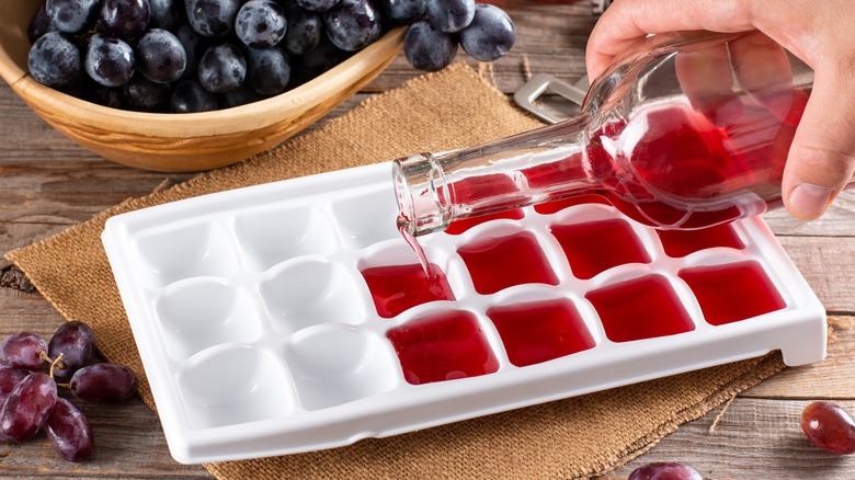 wine poured into ice cube tray