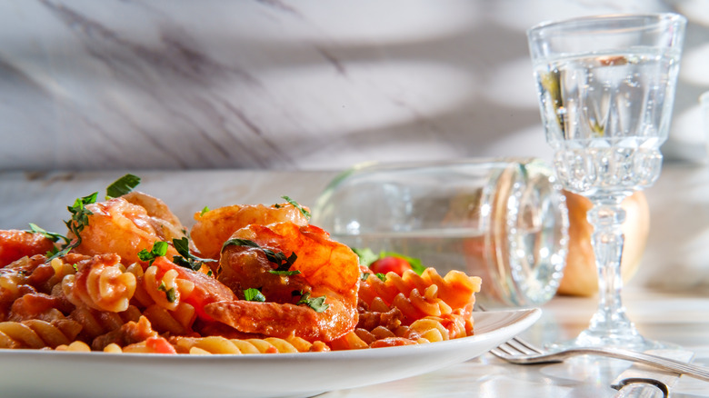 pasta with shrimp and glass